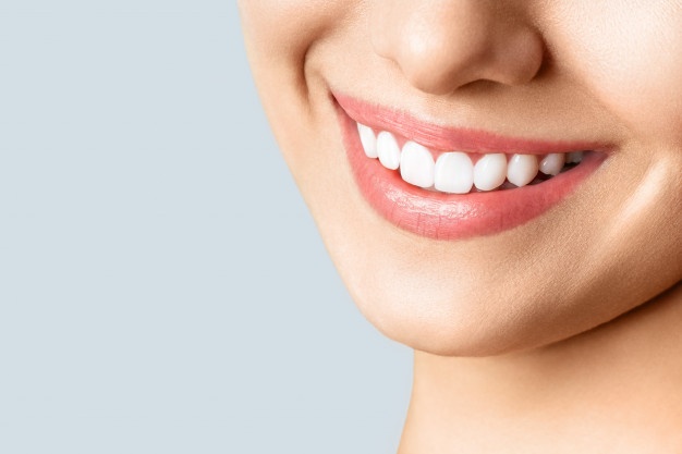 beautiful-female-smile-after-teeth-whitening-procedure_168410-747