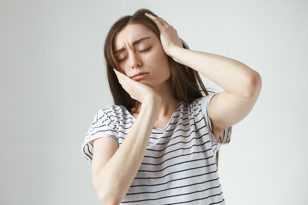 dentistry-healthy-lifestyle-illness-concept-portrait-stressed-young-female-suffering-from-severe-pain-holding-hand-her-cheek-closing-eyes-having-bad-tooth-ache-while-pills-work_343059-1430