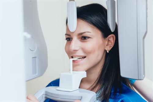 young-woman-patient-standing-x-ray-machine_179755-9506 (1)